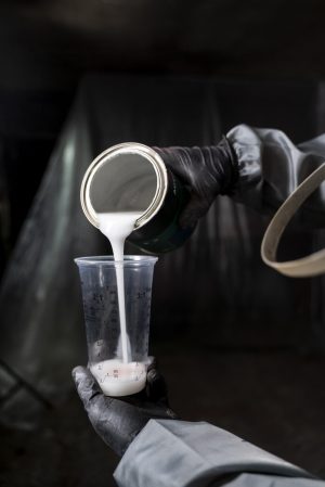 side-view-worker-pouring-paint